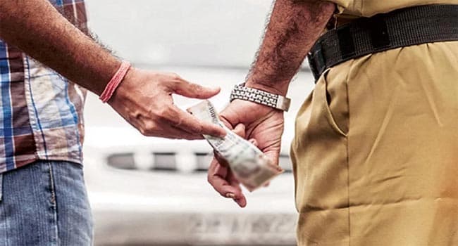 Three cops interdicted for obtaining Rs 60,000 bribe