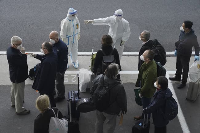 WHO team probing origin of Covid-19 arrives in China