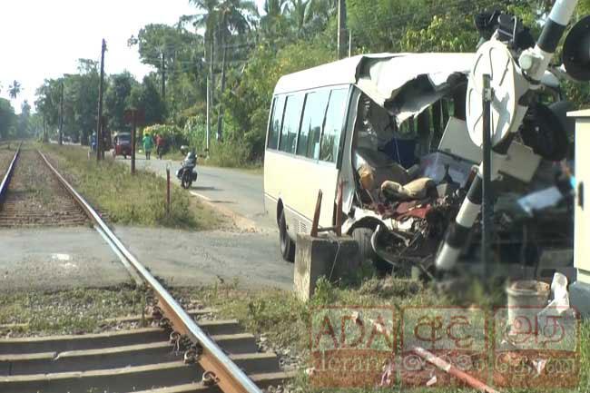 Bus collides with Colombo-bound train in Kalutara
