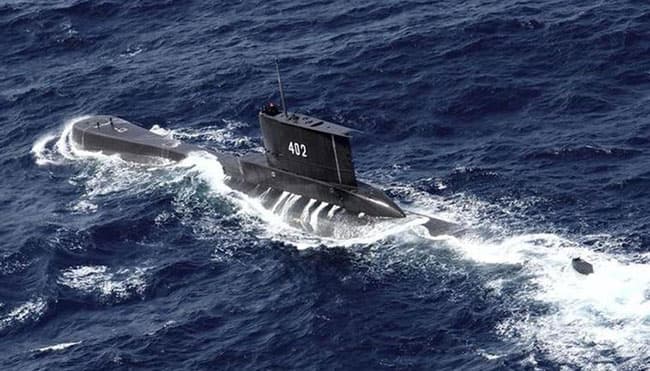 Sunken missing Indonesian submarine found broken into pieces