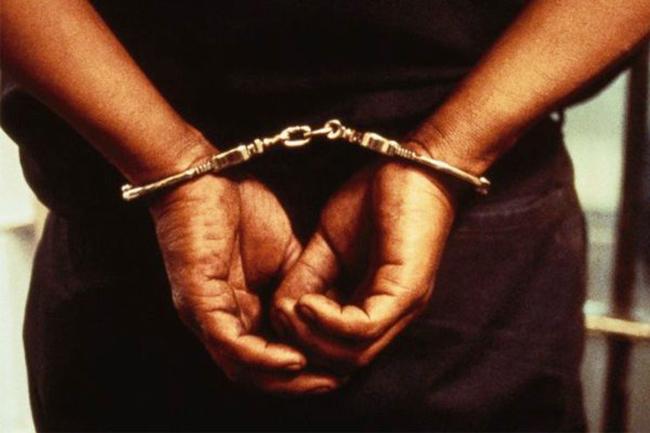 48-year-old arrested for spitting at PHI