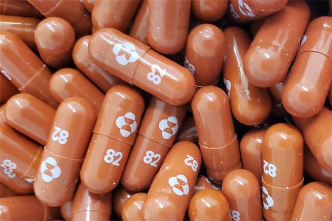 Britain approves Merck’s COVID-19 pill in world first