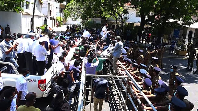 Opposition MPs defy curfew and hold protest march in Colombo