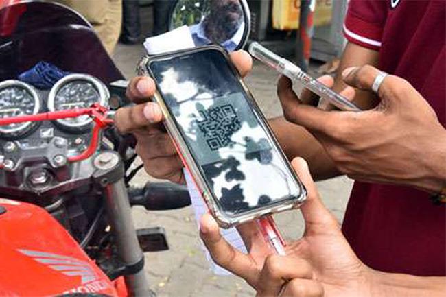 Fuel pass system tested at 25 filling stations island-wide today