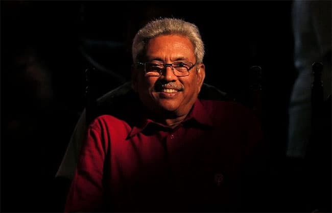 Rights group seeks arrest of former Sri Lanka president in Singapore