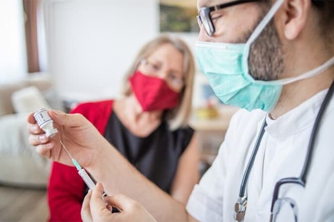 UK becomes first to approve COVID vaccine targeting both Omicron and original strain
