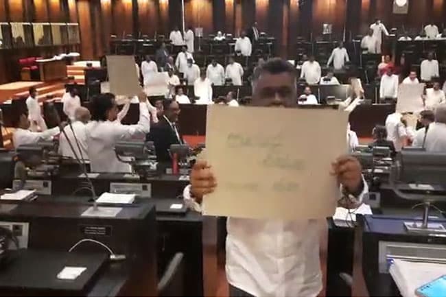 Parliament adjourned as opposition MPs protest demanding LG election