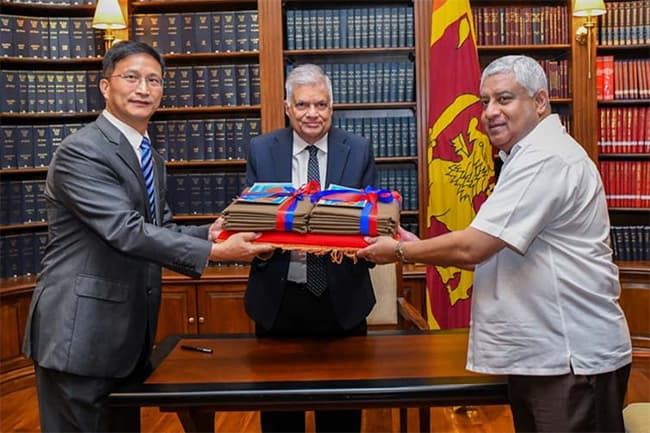 Chinese Embassy donates uniform material for Sri Lanka Police