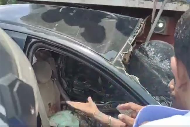 Two dead after vehicle collides with train