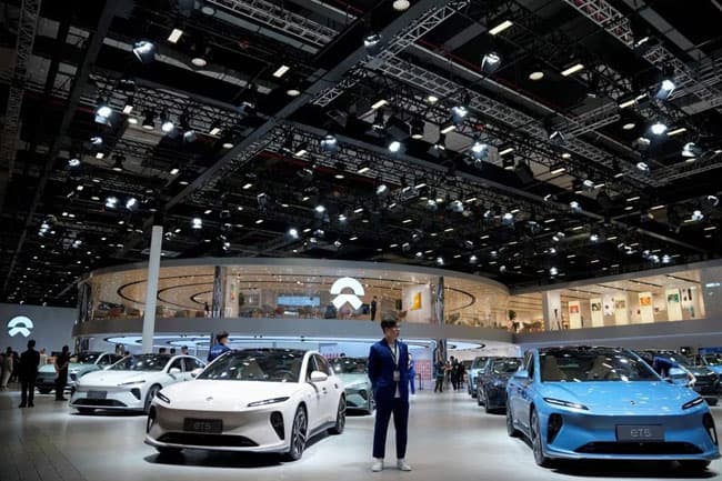 China’s Nio cuts prices, ends free battery swapping as sales slide