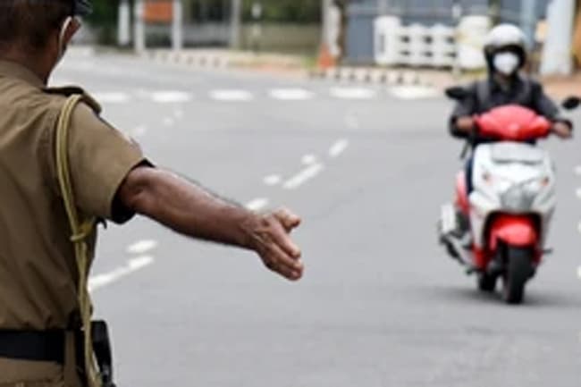 Police open fire at motorcycle defying orders at checkpoint