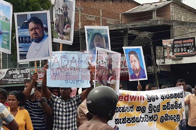 Protest launched after financial institution allegedly swindles over Rs. 2 bn