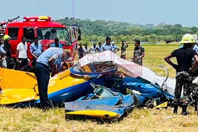 Two dead after training aircraft crashes near China Bay
