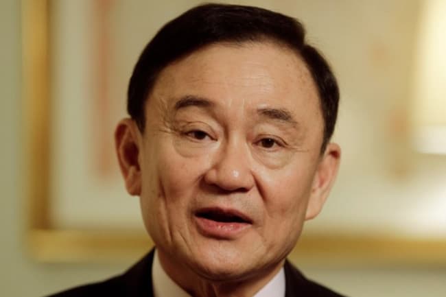 Thai king commutes former PM Thaksin’s prison term to one year