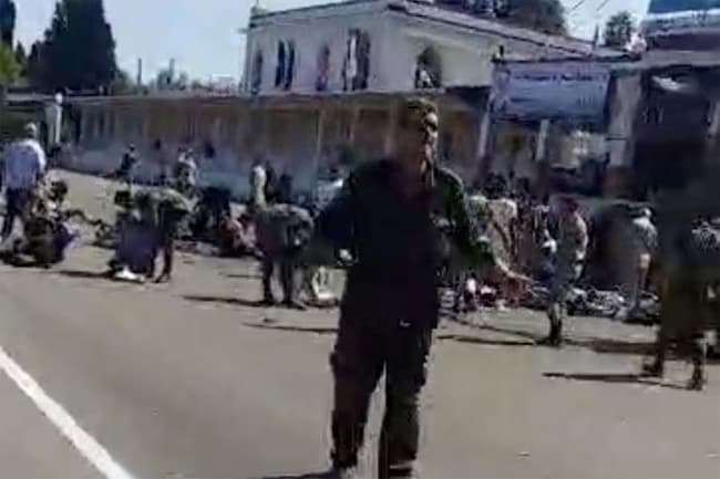 Drone attack on military college in Syria kills at least 100