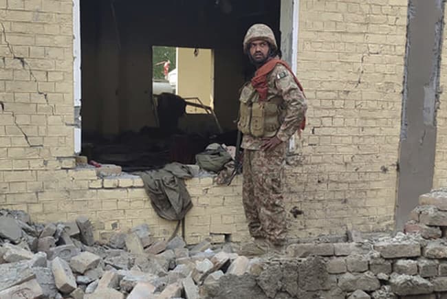 Suicide bomber attacks police station in northwest Pakistan, killing 22 officers and wounding 32