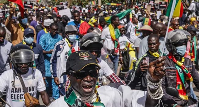Senegal election: Opposition supporters march in Dakar calling for swift vote