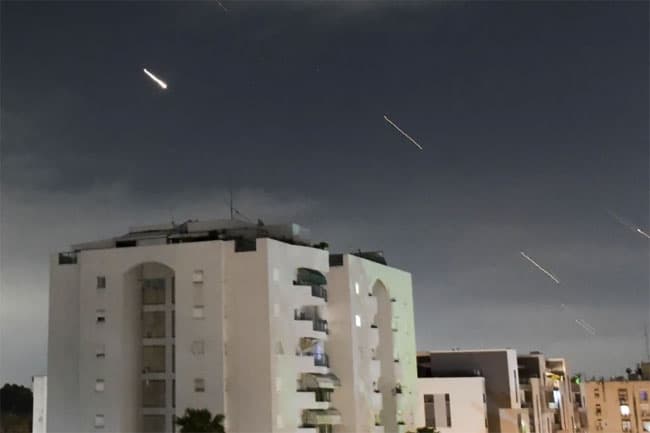 Booms and sirens in Israel after Iran launches over 200 missiles and drones in unprecedented attack