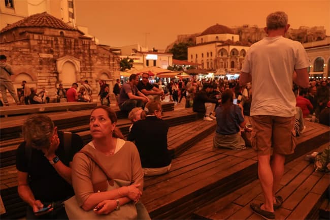 Athens: Greece’s capital turns an orange hue with dust clouds from Sahara Desert