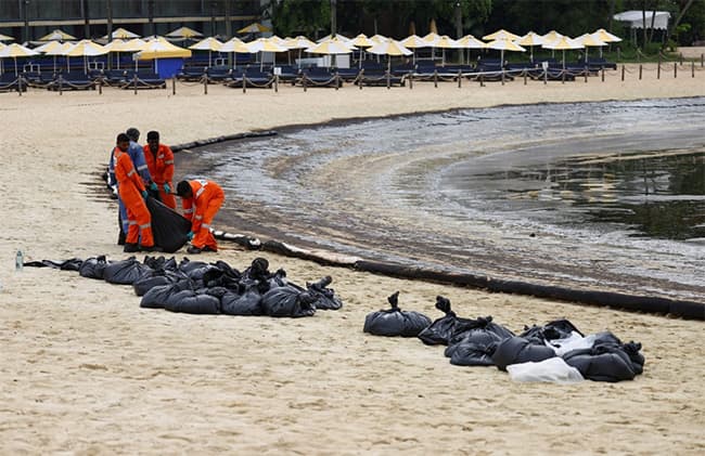 Singapore says dredger lost control and hit tanker causing oil spill