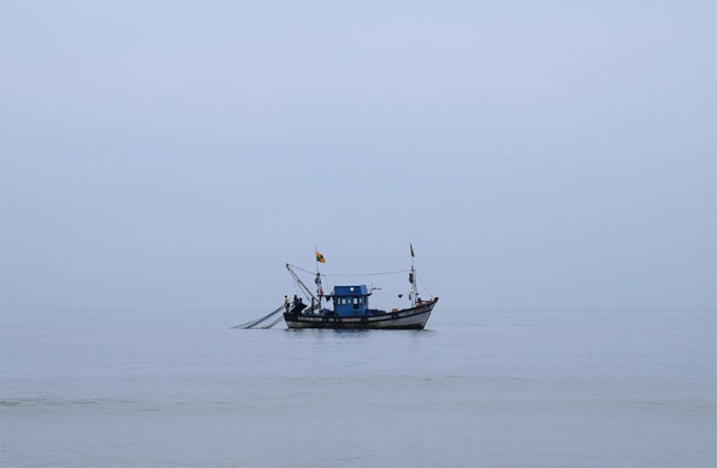 Four fishermen die after drinking from bottle found in sea; 2 survivors taken aboard merchant vessel