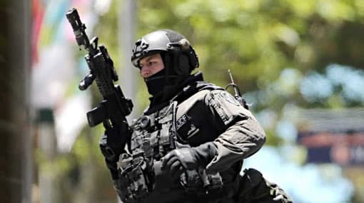 Sydney siege: two dead, three seriously injured as police storm cafe