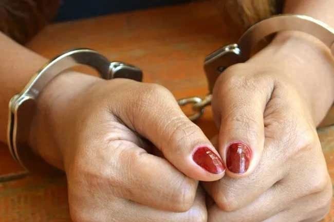 Female non-academic staff member of school arrested with heroin