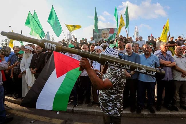 Israeli airstrikes in Syria escalate, killing 14 and wounding over 40