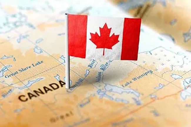 Canada to cut immigration numbers, government source says