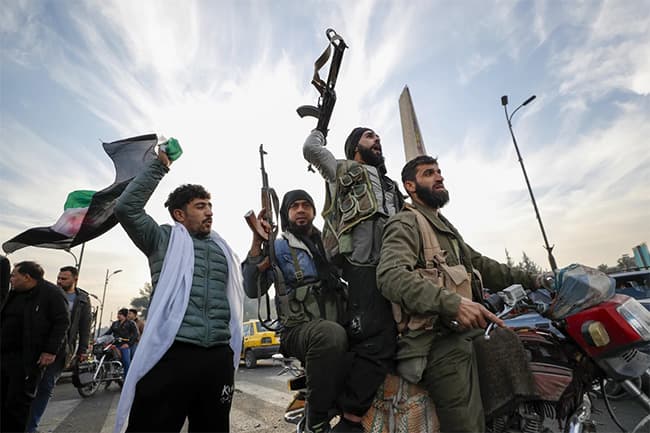 Syrian government falls to fast-moving rebels, ending 50 years of iron rule by the Assad family