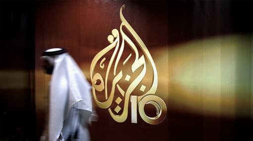 Al Jazeera journalists: Don’t treat us like ‘criminals’