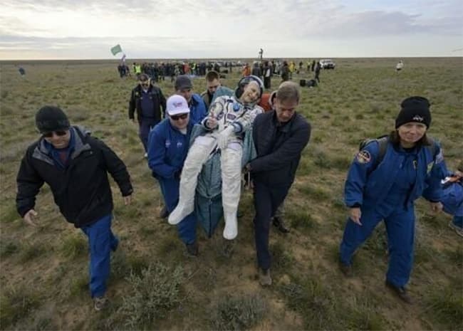 Oldest serving US astronaut returns to Earth on 70th birthday