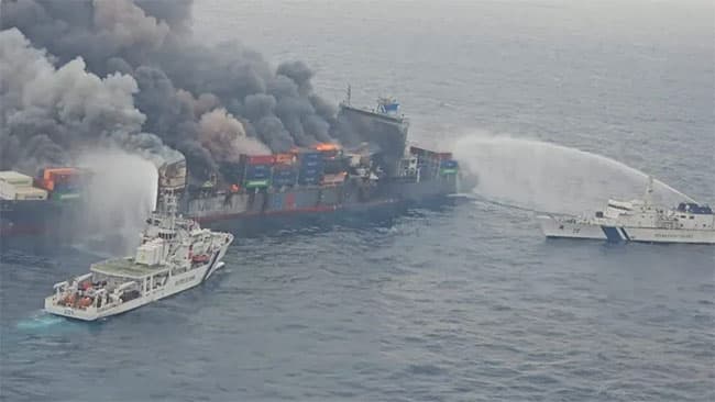 Four crew members missing as Singapore-flagged cargo ship burns off India coast