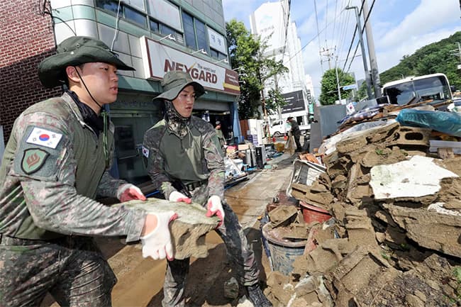Death toll rises to 14 in South Korea as heavy rain triggers landslide and flooding