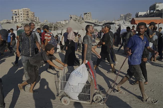 Israeli military says it will pause fighting in 3 areas of Gaza to address surging hunger