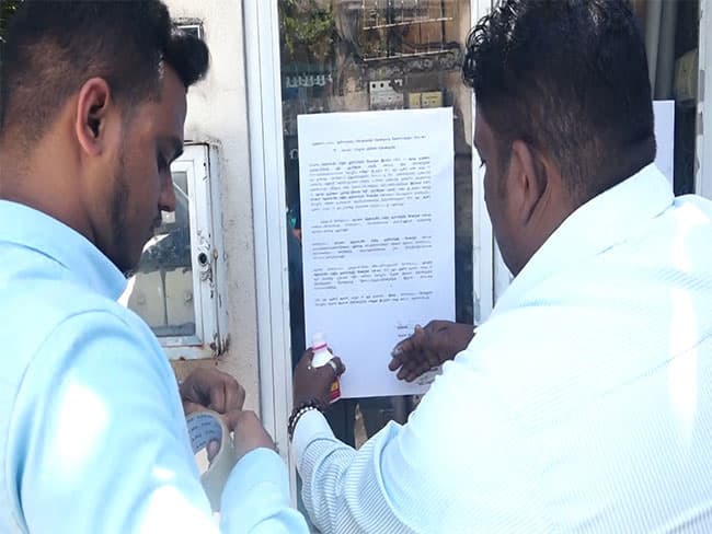 Officials post court notice at ex-Minister Rajitha’s residence