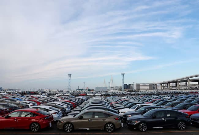 Trump signs order to cut tariffs on Japanese cars to 15%