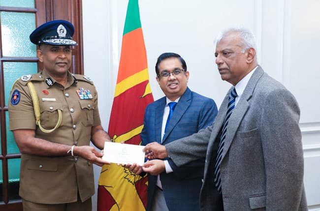 Sri Lanka Police officers donate day’s salary to ‘Rebuilding Sri Lanka’ fund