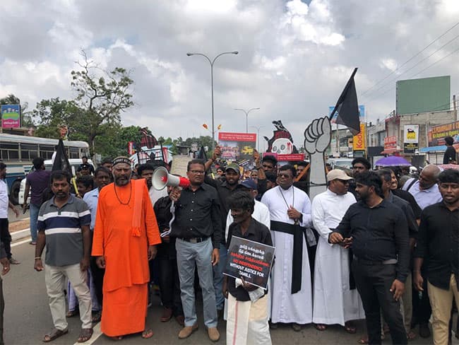 Relatives of missing persons stage ‘black flag’ protest in Kilinochchi