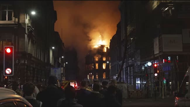 Huge fire in Scotland triggers train chaos as historic building partially collapses