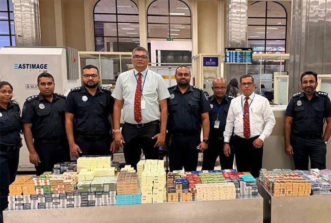 Five Chinese nationals arrested at BIA with cigarettes and used phones worth Rs. 18 million