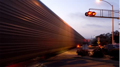 Two killed as car collides with train