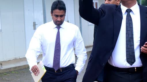 Aloysius arrives to submit Bank Statements