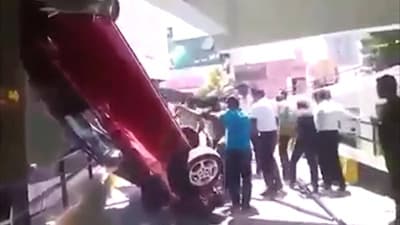 Car falls from parking garage in Colpetty