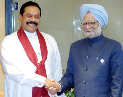 Rajapaksa returns home after India visit