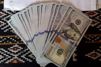Indonesian Police show cash paid to people smugglers