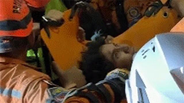 Man, 21, pulled alive from Venezuelan rubble after being trapped for 106 hours
