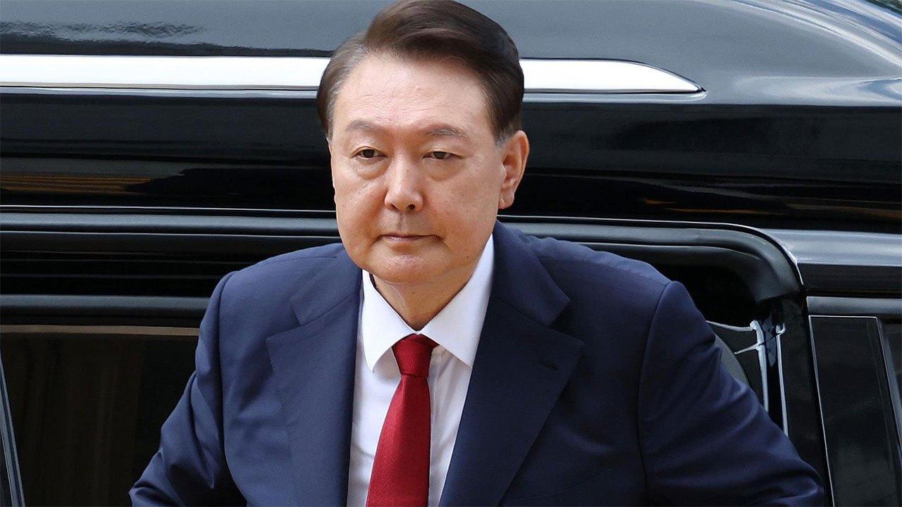 South Korea court sentences ex-president to 2 years in jail in political funding case