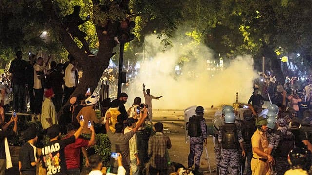 India's Modi promises fast-track courts on exam leaks, protesters want minister to quit