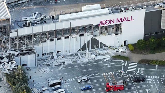 Japan quake injures at least 50, disrupts power and travel
